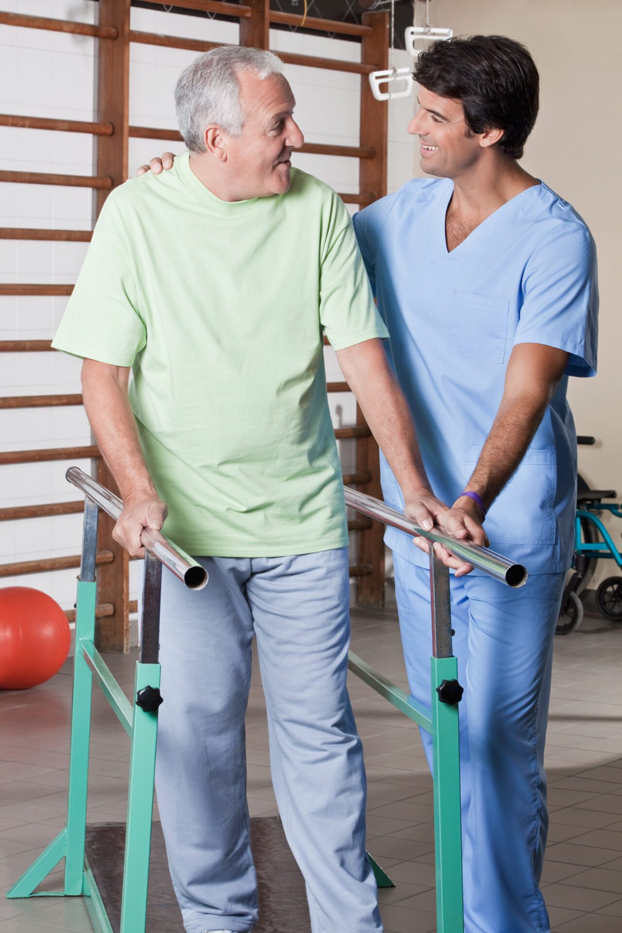 Senior man having ambulatory therapy with his therapist Senior man having ambulatory therapy with his therapist